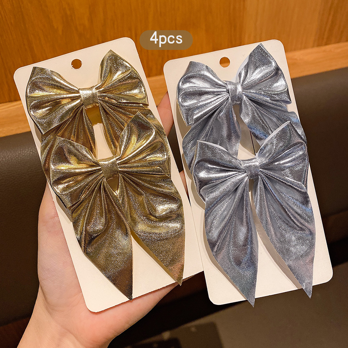 4 fashionable bow hair clips i - Tie Clip Silver recension och pris